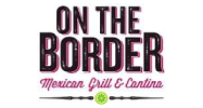 A mexican restaurant with a large menu of food.